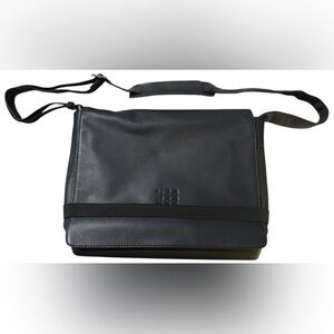Moleskine Black Leather Laptop Bag w/ adj. waist strap.